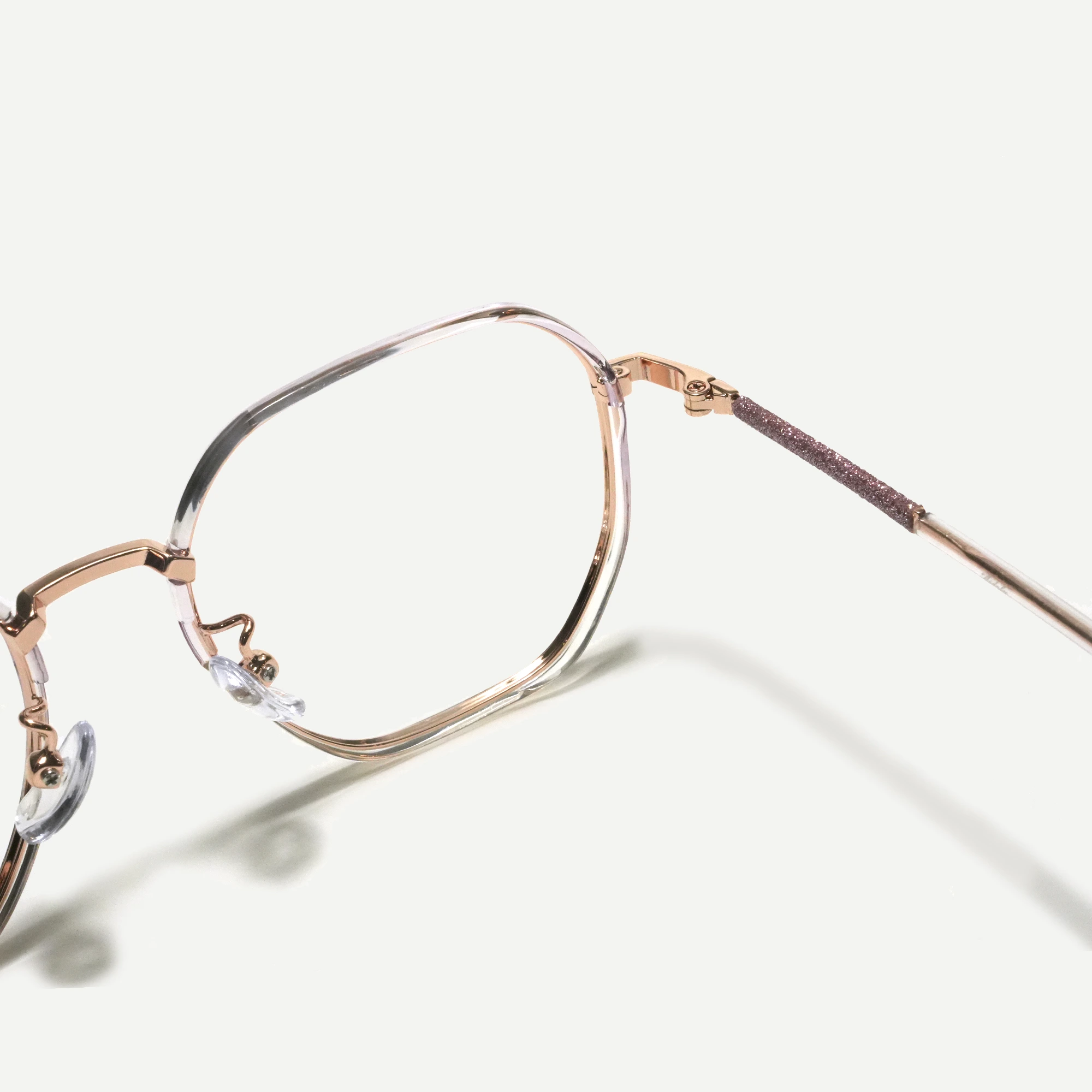 OPTIK21_0146_M2877_ROSA_DORADO_ZOOM